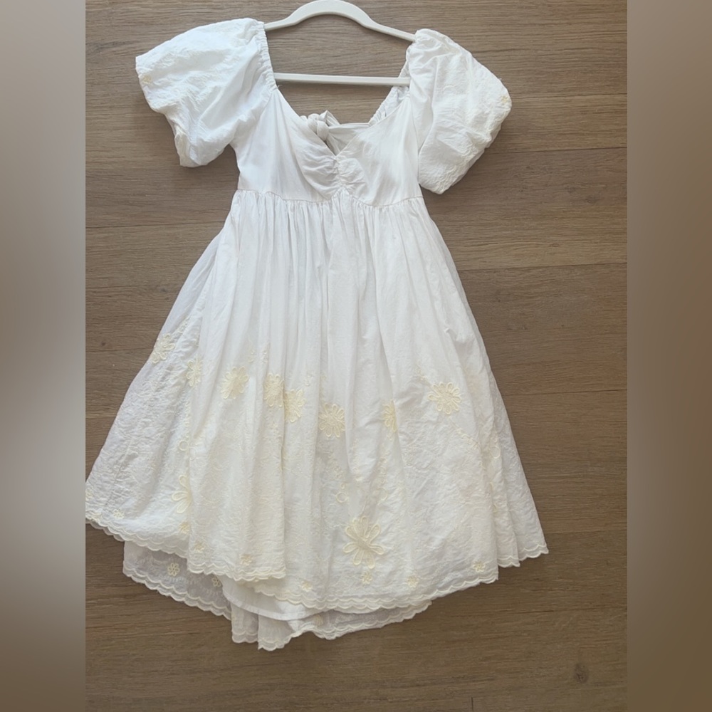 Urban Outfitters white mini dress with yellow flower embroidery